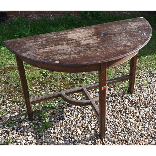 372 - A George III oak demi-lune hall table, on three square section legs united by a stretcher, 114 x 55 ... 