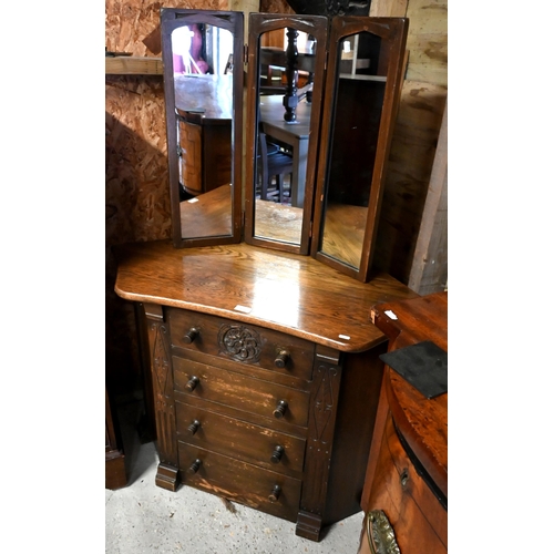 373 - An Old Charm style oak four drawer corner chest to/w a three fold dressing mirror (2)