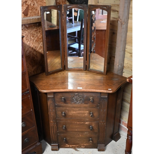 373 - An Old Charm style oak four drawer corner chest to/w a three fold dressing mirror (2)