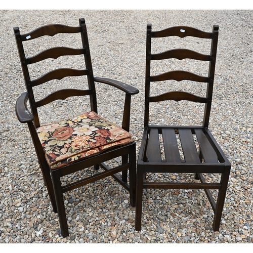 376 - #An Ercol Old Colonial extending dining table and set of six chairs (two carvers, four side) the tab... 