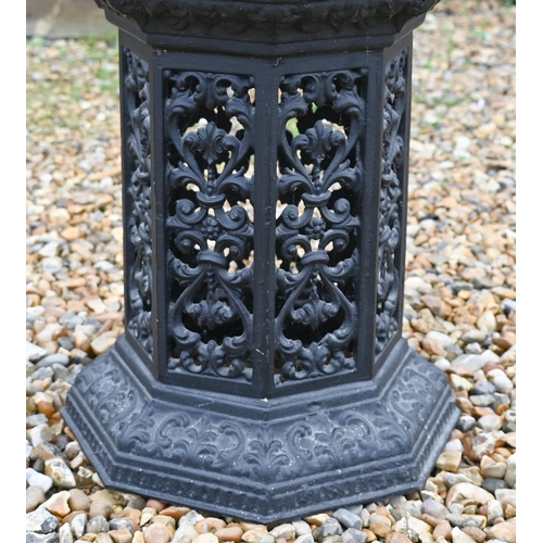 388 - A cast iron Victorian style greenhouse heater body with veined marble travertine top, to/w a chess b... 