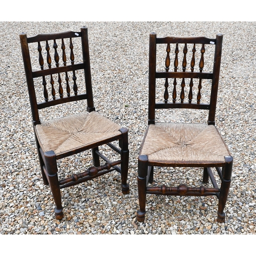 389 - A set of five antique spindle back rope seat side chairs, to/w a similar carver chair - all a/f (6)