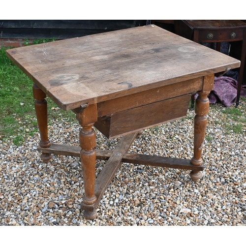 409 - A country oak kitchen table with under drawer on turned legs united by a cross stretcher, 105 x 86 x... 