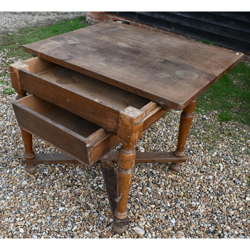 409 - A country oak kitchen table with under drawer on turned legs united by a cross stretcher, 105 x 86 x... 