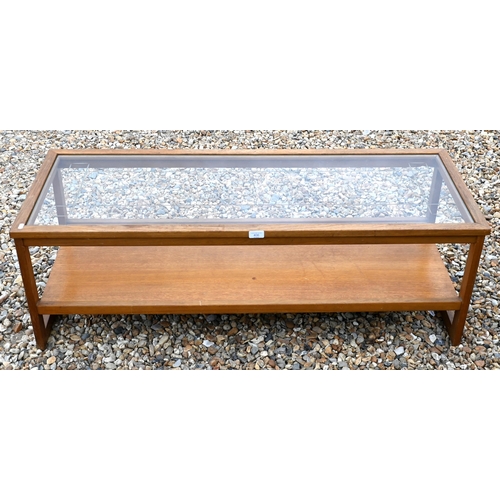 411 - A teak glass top mid-century coffee table with under-tier, 123 cm x 46 cm x 41 cm