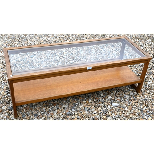 411 - A teak glass top mid-century coffee table with under-tier, 123 cm x 46 cm x 41 cm