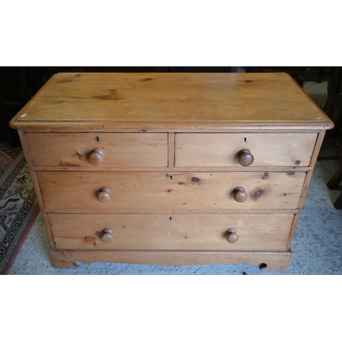 415 - An old stripped pine chest of two short over three long drawers on shaped bracket feet, to/w a dress... 