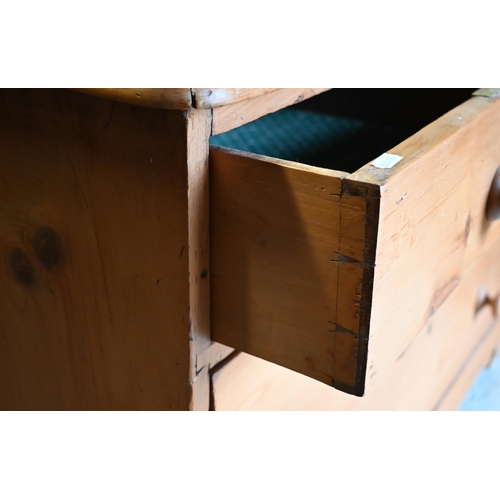 415 - An old stripped pine chest of two short over three long drawers on shaped bracket feet, to/w a dress... 