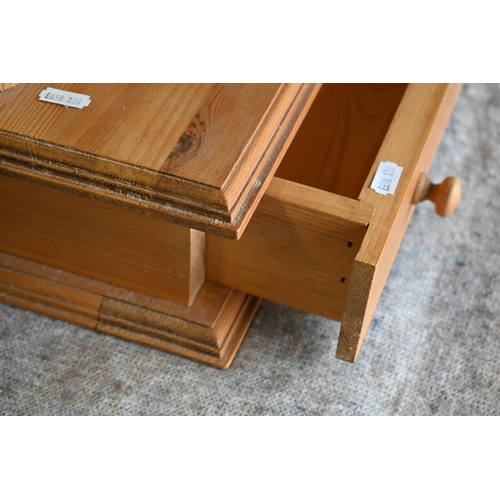 415 - An old stripped pine chest of two short over three long drawers on shaped bracket feet, to/w a dress... 