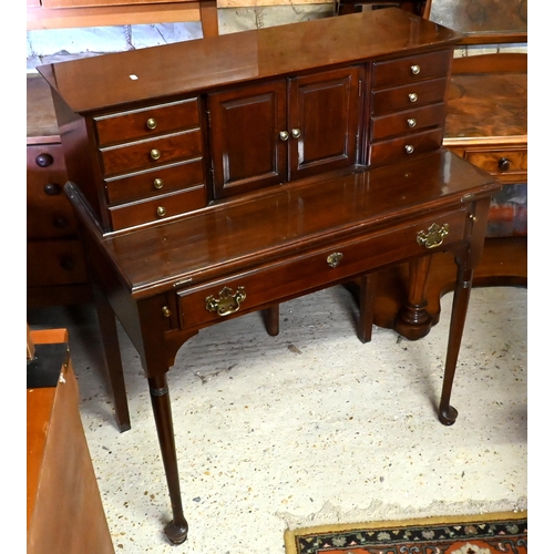 418 - Pennsylvania House, a 19th century style bright mahogany bonheur du jour style desk, on club legs, 8... 