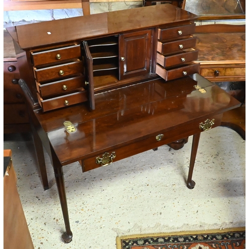 418 - Pennsylvania House, a 19th century style bright mahogany bonheur du jour style desk, on club legs, 8... 