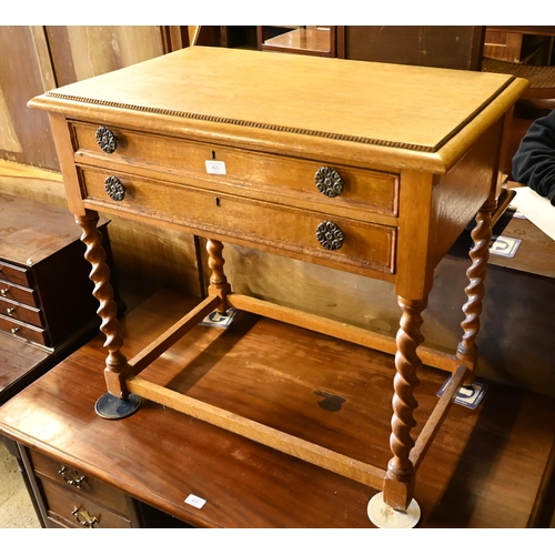 420 - An old golden oak two drawer side table - the drawers fitted for a canteen of cutlery, on baluster t... 