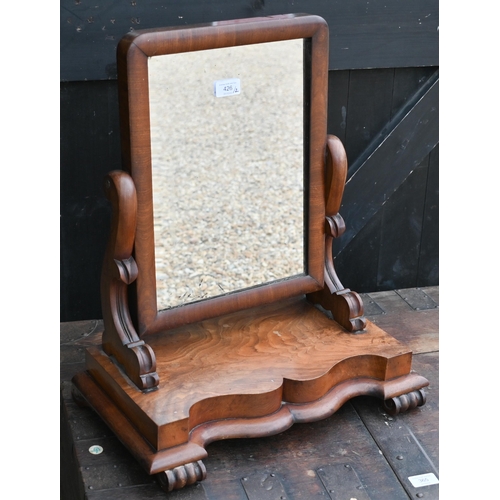 426 - A Victorian mahogany toilet mirror on serpentine platform base and moulded feet, 46 x 26 x 54 cm hig... 