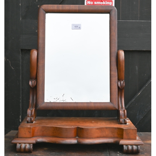 426 - A Victorian mahogany toilet mirror on serpentine platform base and moulded feet, 46 x 26 x 54 cm hig... 