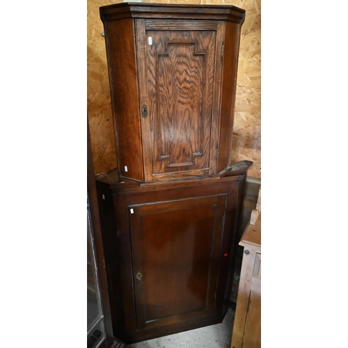 443 - #A George III mahogany hanging corner cupboard to/w a smaller oak corner cupboard (2)