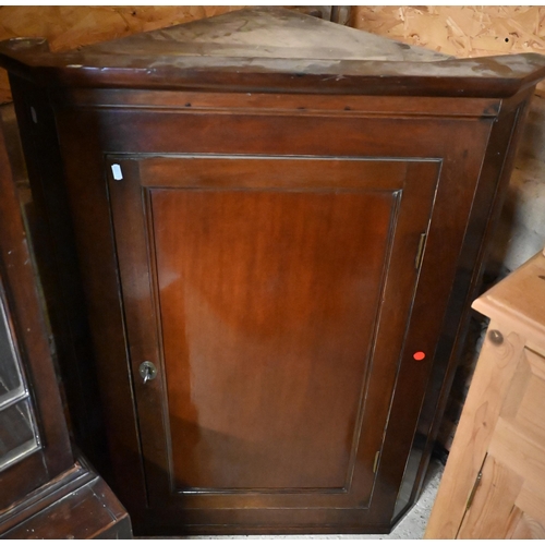 443 - #A George III mahogany hanging corner cupboard to/w a smaller oak corner cupboard (2)