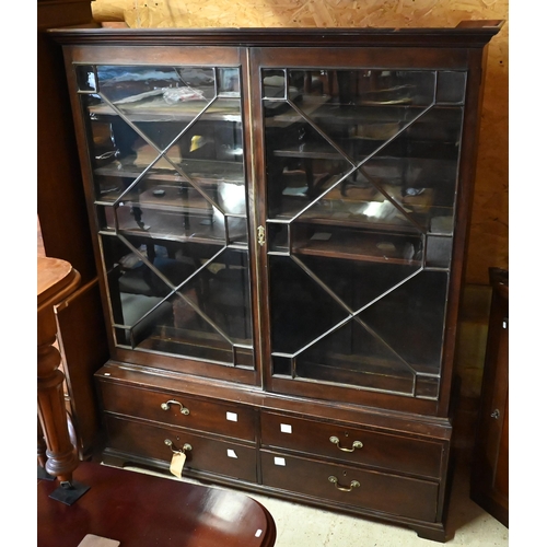 444 - An antique mahogany library cabinet with pair of astragal glazed doors enclosing adjustable shelves ... 