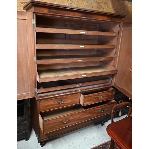 446 - Victorian mahogany linen press with fitted slides over two short and two long drawers, raised on tur... 