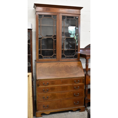 448 - #Edwardian bureau bookcase with astragal glazed doors over fall front panel enclosing fitted interio... 