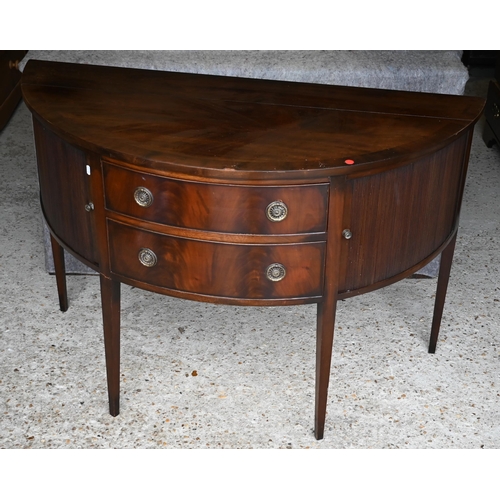 451 - #A Victorian mahogany demi-lune sideboard centred by two drawers flanked by tambour cabinet doors, o... 