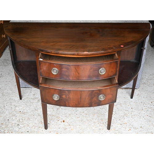 451 - #A Victorian mahogany demi-lune sideboard centred by two drawers flanked by tambour cabinet doors, o... 