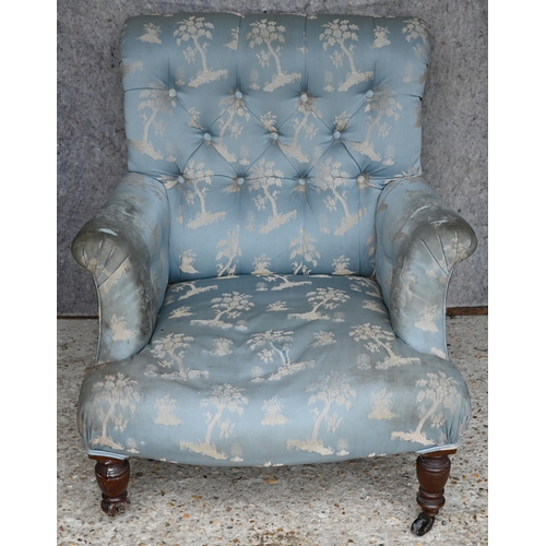 455 - A Victorian button backed low armchair to/w a high backed blue upholstered chair (2)