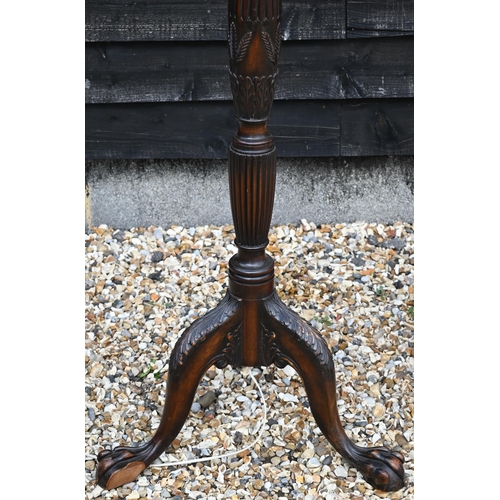 458 - A Chippendale style standard lamp with tripod legs and claw feet, 168 cm high to/w brass table lamp,... 