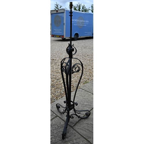 469 - A wrought iron telescopic standard lamp in the Art Nouveau style, 143 cm high