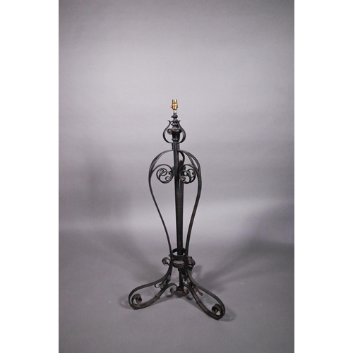 469 - A wrought iron telescopic standard lamp in the Art Nouveau style, 143 cm high