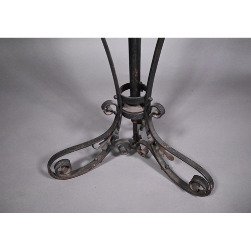 469 - A wrought iron telescopic standard lamp in the Art Nouveau style, 143 cm high