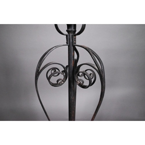 469 - A wrought iron telescopic standard lamp in the Art Nouveau style, 143 cm high