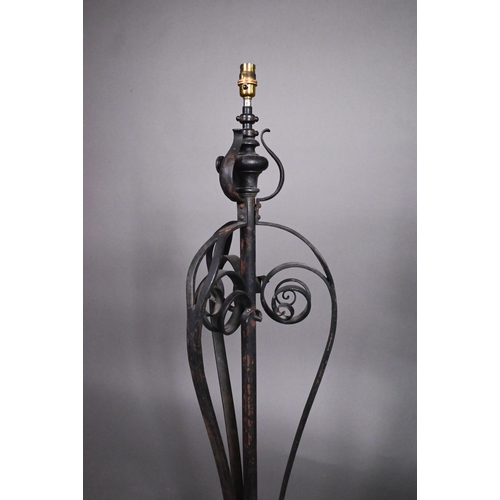 469 - A wrought iron telescopic standard lamp in the Art Nouveau style, 143 cm high