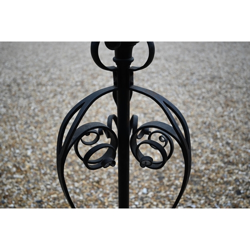 469 - A wrought iron telescopic standard lamp in the Art Nouveau style, 143 cm high