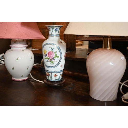 480 - Two pairs of table lamps, a pair of floral Dresden style ceramics lamps, one plain pink spiral glass... 