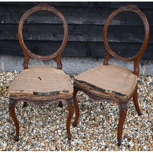 485 - A set of Victorian balloon back salon chairs with floral carving and cabriole front legs with floral... 