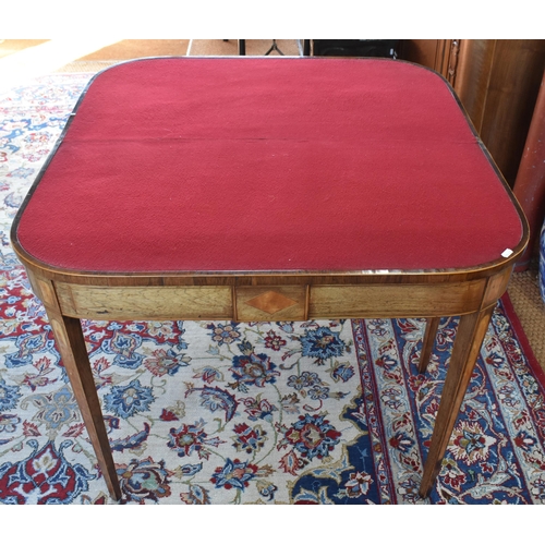 488 - A 19th century rosewood and satin banded card table with folding scarlet felt lined top raised on sq... 