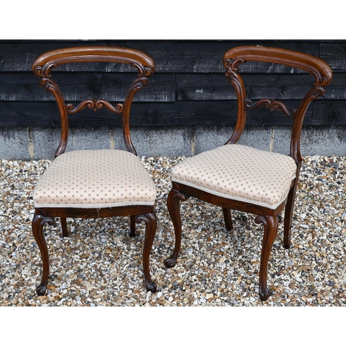 502 - A set of six early Victorian rosewood sabre leg dining side chairs, with overstuffed seats (6)