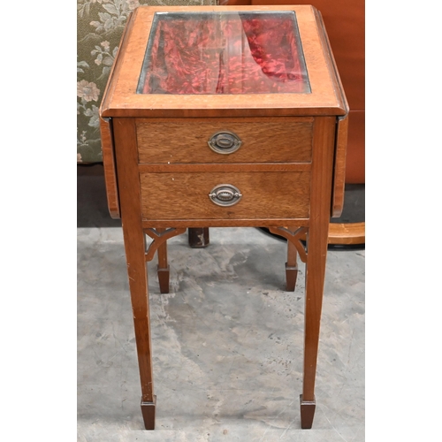 517 - Walnut and burr vitrine table with lower drawer and two drop leaves, on square tapering supports wit... 