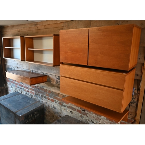 71 - A quantity of Beaver & Tapley teak wall mounted modular furniture including drawers, open booksh... 