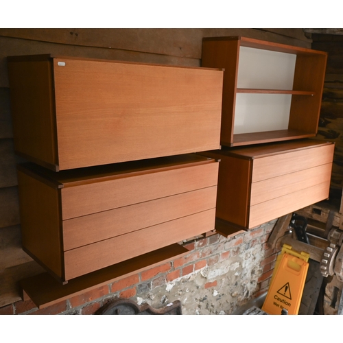 71 - A quantity of Beaver & Tapley teak wall mounted modular furniture including drawers, open booksh... 