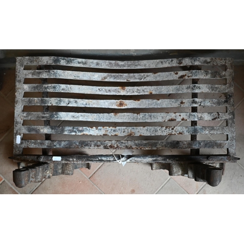 72 - An old cast iron fire grate to/w a pair of dogs, approx. 63 cm w x 31 cm d (3)