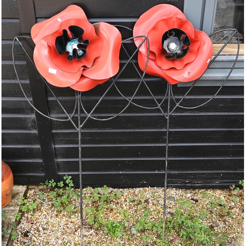 79 - #A pair of large garden 'poppy' spikes (2)