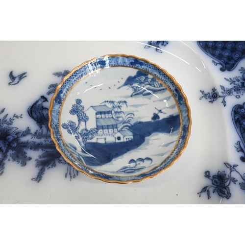 99 - #A 19th century Chinese blue and white saucer, painted with typical landscape, 12.5 cm to/w a Victor... 