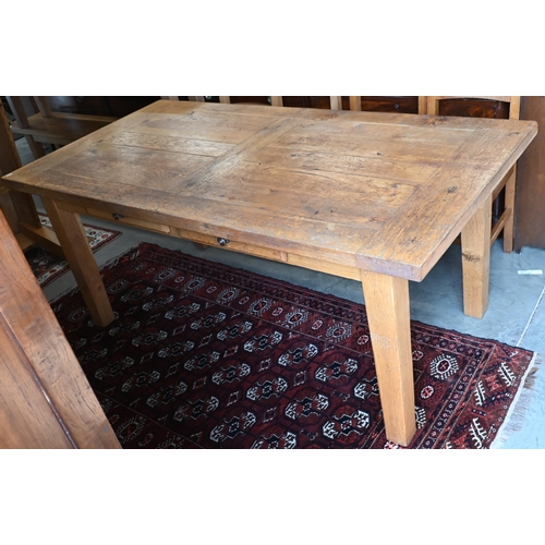 221 - A provincial French oak dining table with cleated rectangular top raised on square leg, 180 x 90 x 7... 