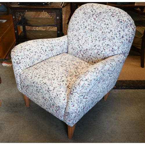 238 - A modern cream ground 'dappled ink' effect upholstered armchair