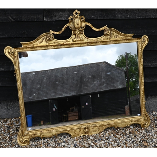 243 - A large modern wall mirror in decorative gilt frame, 125 cm x 115 cm