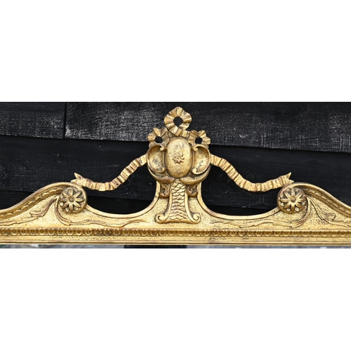 243 - A large modern wall mirror in decorative gilt frame, 125 cm x 115 cm