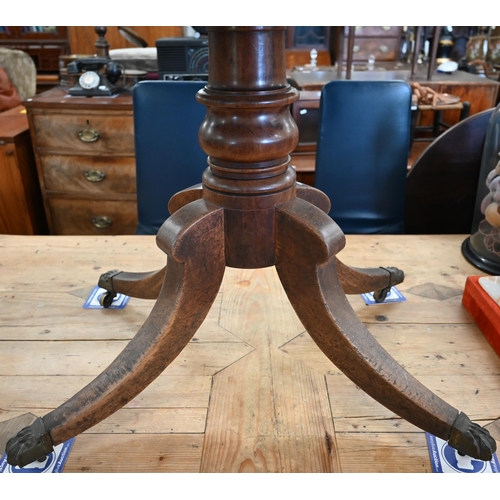 273 - George IV mahogany rectangular tilt top supper table, on turned pillar and four swept supports with ... 