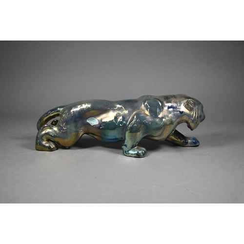 72 - A French Gres-Flammes Vosges Rambervillers earthenware stalking tiger with silver-resin lustre glaze... 