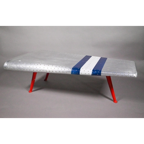 181 - A rivetted vintage alloy aeroplane wing style tripod coffee table